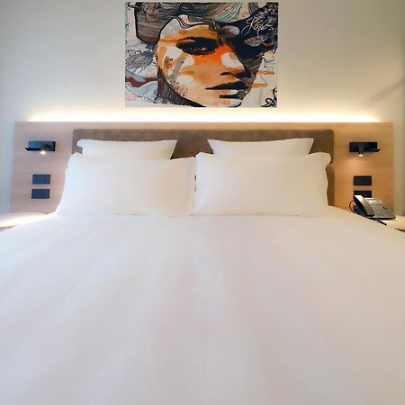 Bergamo INN 21 Bagian luar foto A room at the hotel
