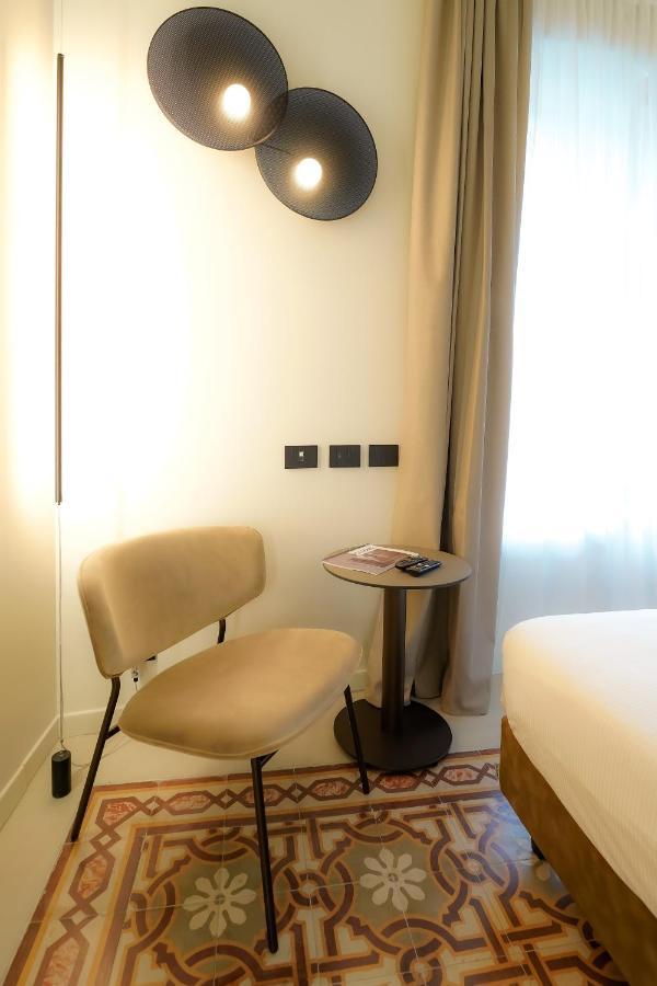Bergamo INN 21 Bagian luar foto A room at the hotel